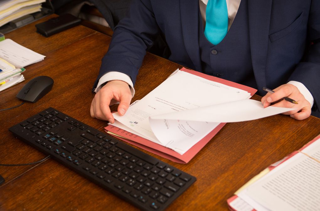 john-indpecting-paperwork.jpg